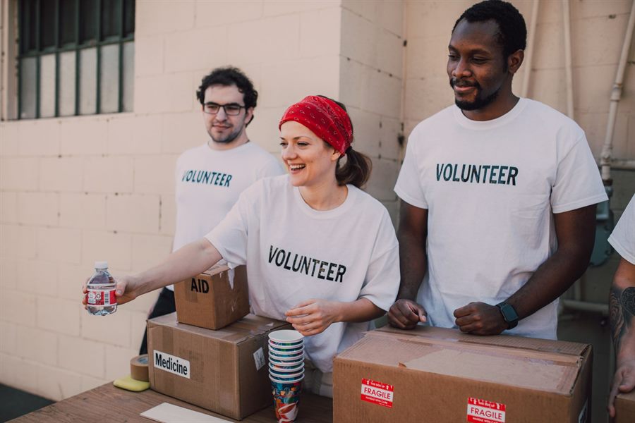 Volunteers running a community fundraiser event
