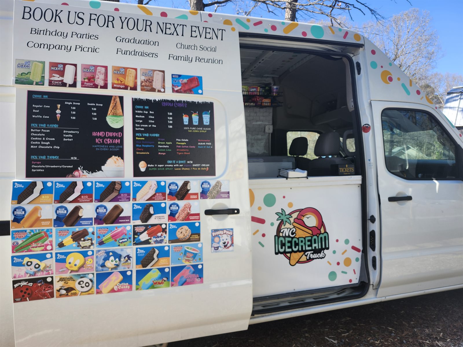 NC Icecream truck parked at an event with its serving window open