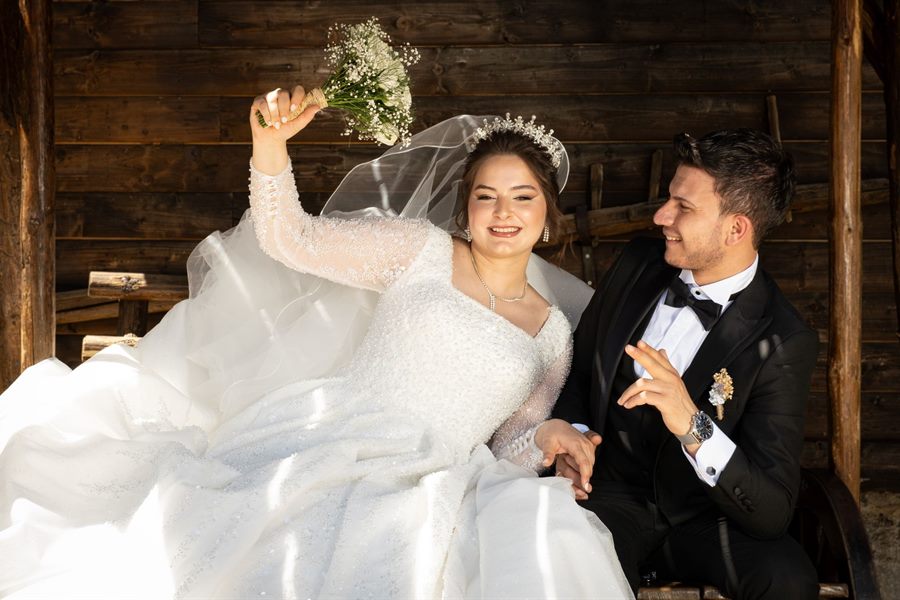 Newlyweds celebrating together at their wedding reception